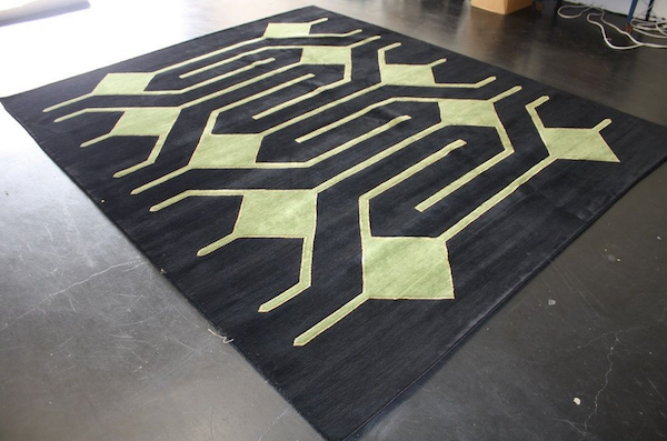 Green geometric maze rug