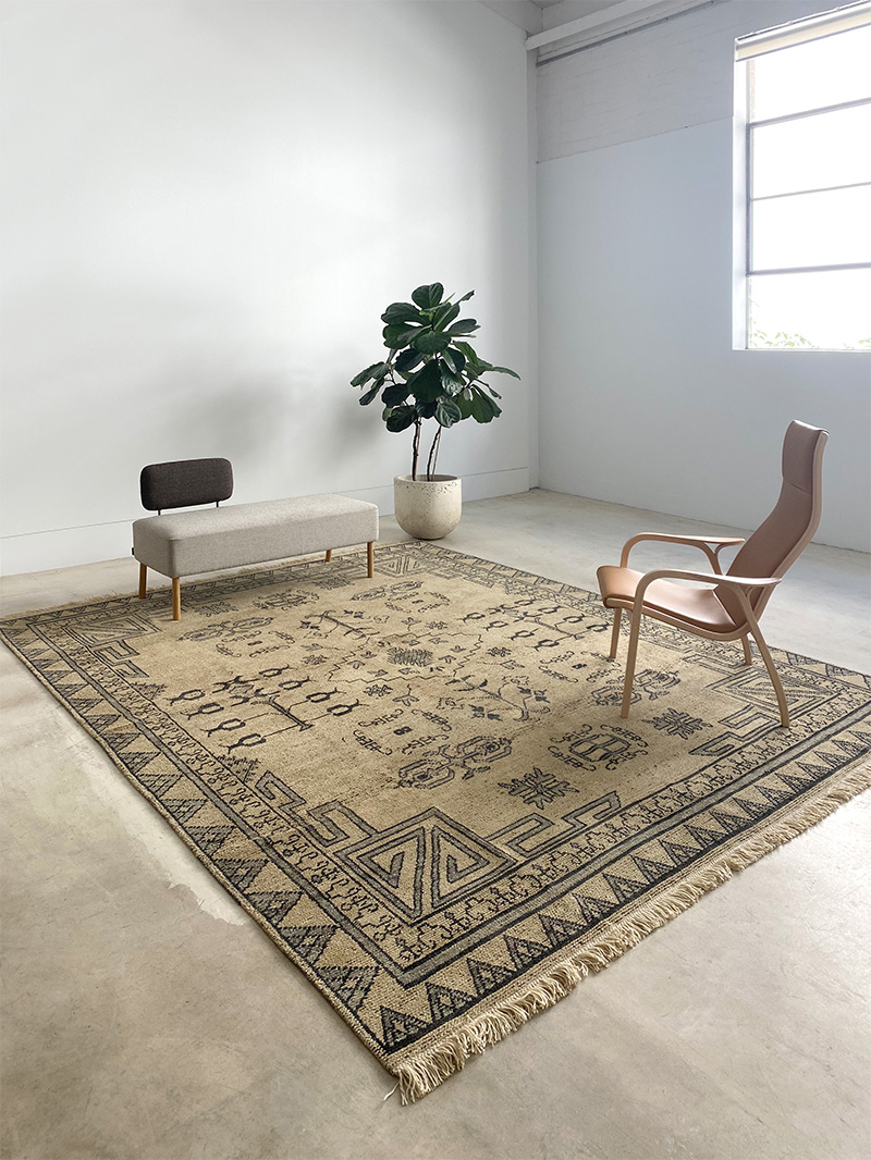 gold and black tribal rug