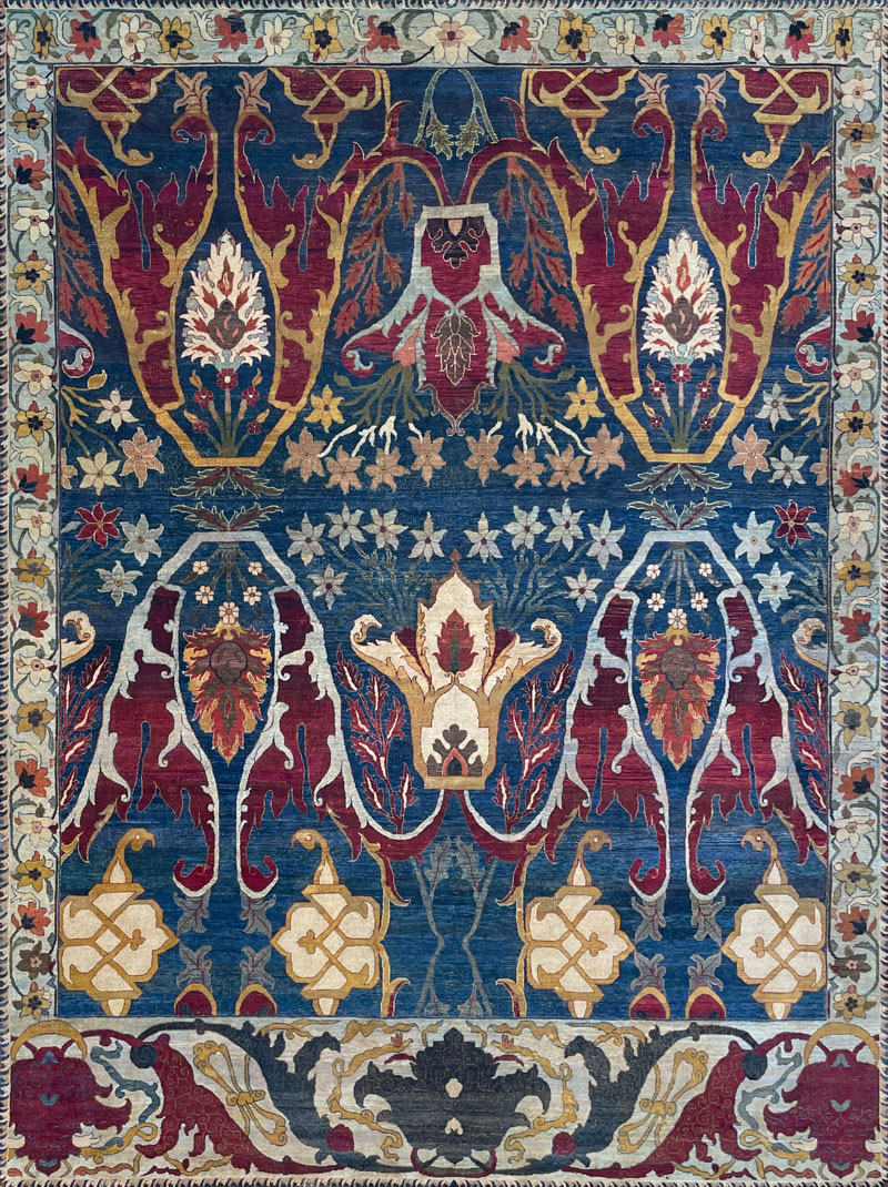 Traditional low pile, red and blue tones, wool and silk rug