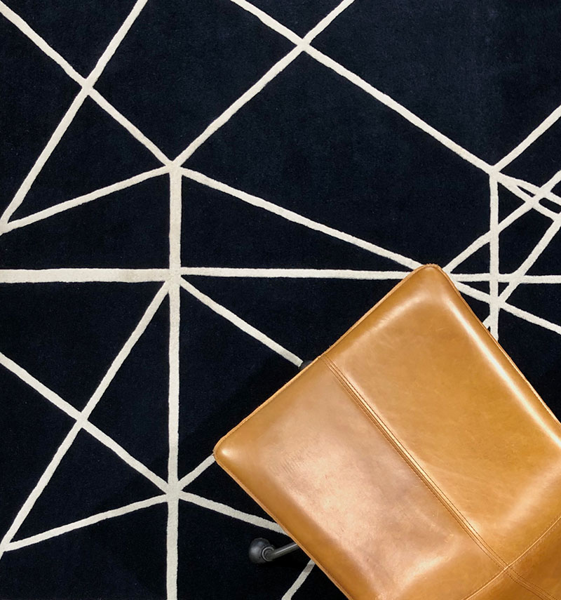 Wool and solk, geometric, intercrossing lines, navy and white rug