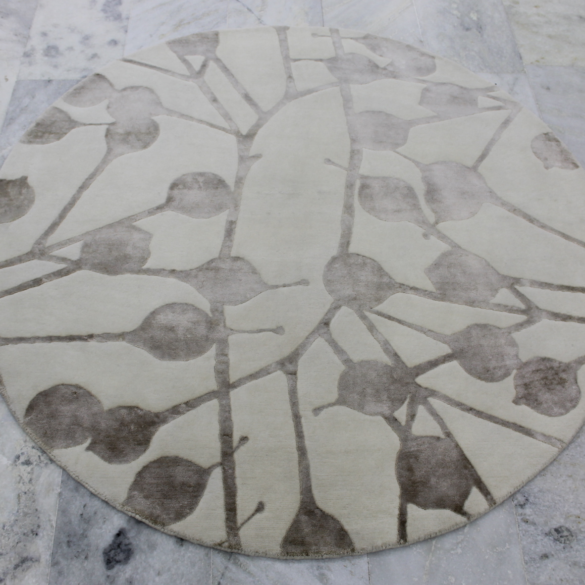 Modern round botanical rug