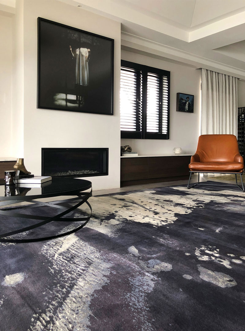 Bold, black, splashes of cream, wool rug