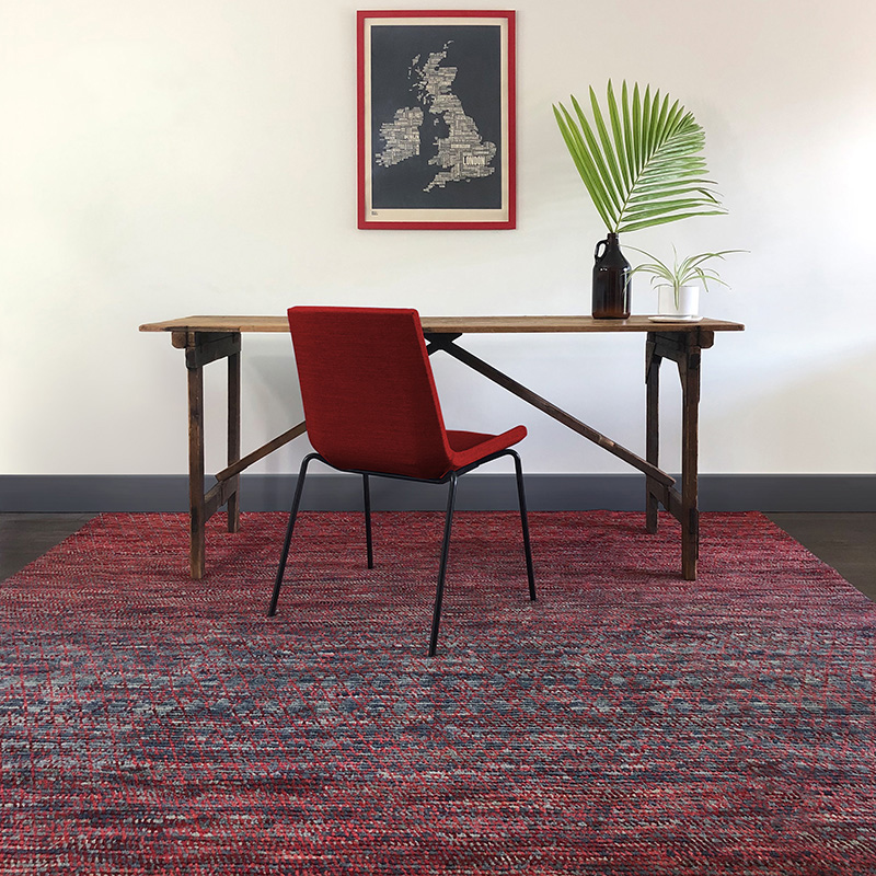 Crimson and navy blue textured rug