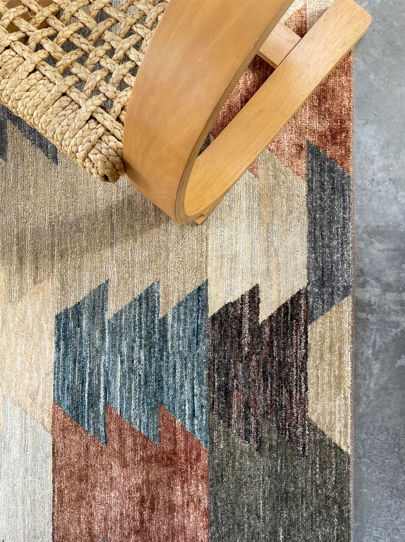 Bold, geometric, warm tones, wool rug