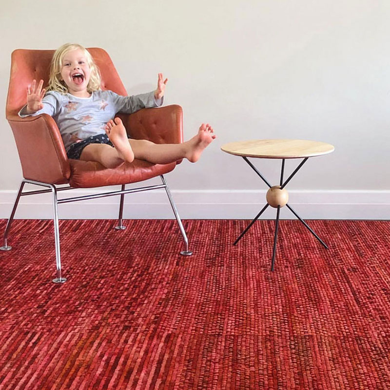 Deep red, wool textured rug