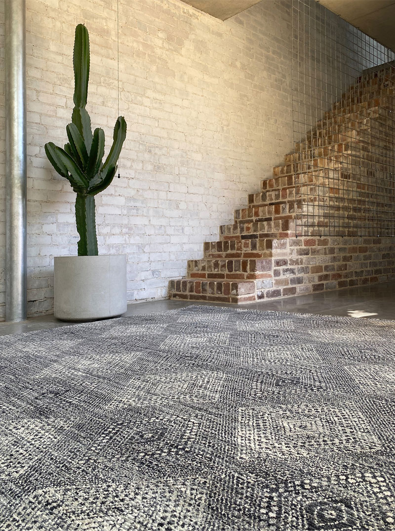 Aztec, diamond pattern, muted charcoal and neutral tones, wool rug