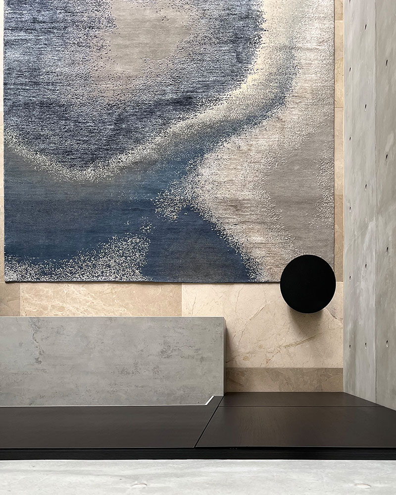 deep indigo, mid blue, neutral and silvery tones, wool and silk rug