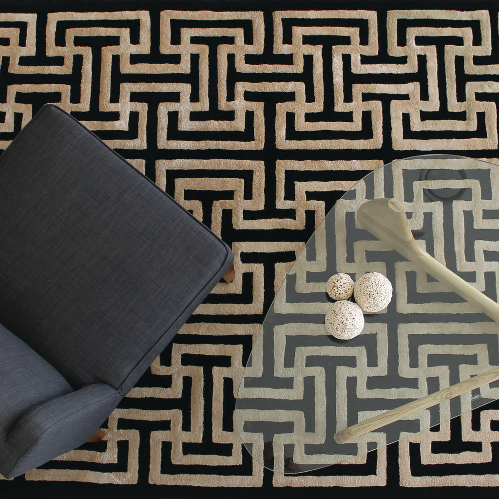 Traditional black gold rug