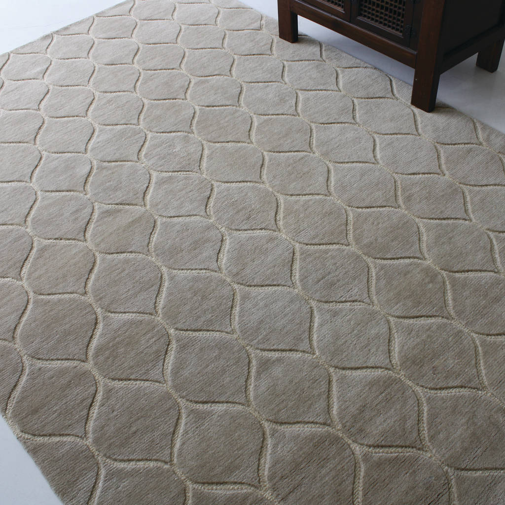 Carved neutral rug